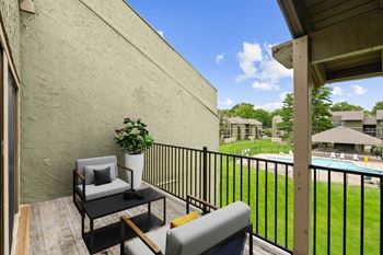 Private balcony with chair and table